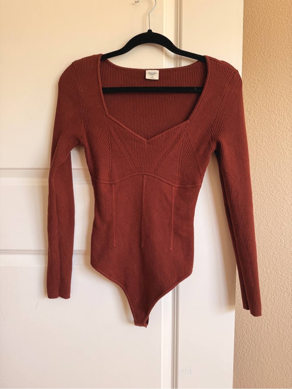 Abercrombie & Fitch Ribbed Long-Sleeve Bodysuit in Rust
